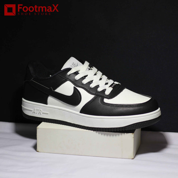 crafted from premium leather, the Nike Low Cat Sneaker offers both style and durability. - footmax (Store description)